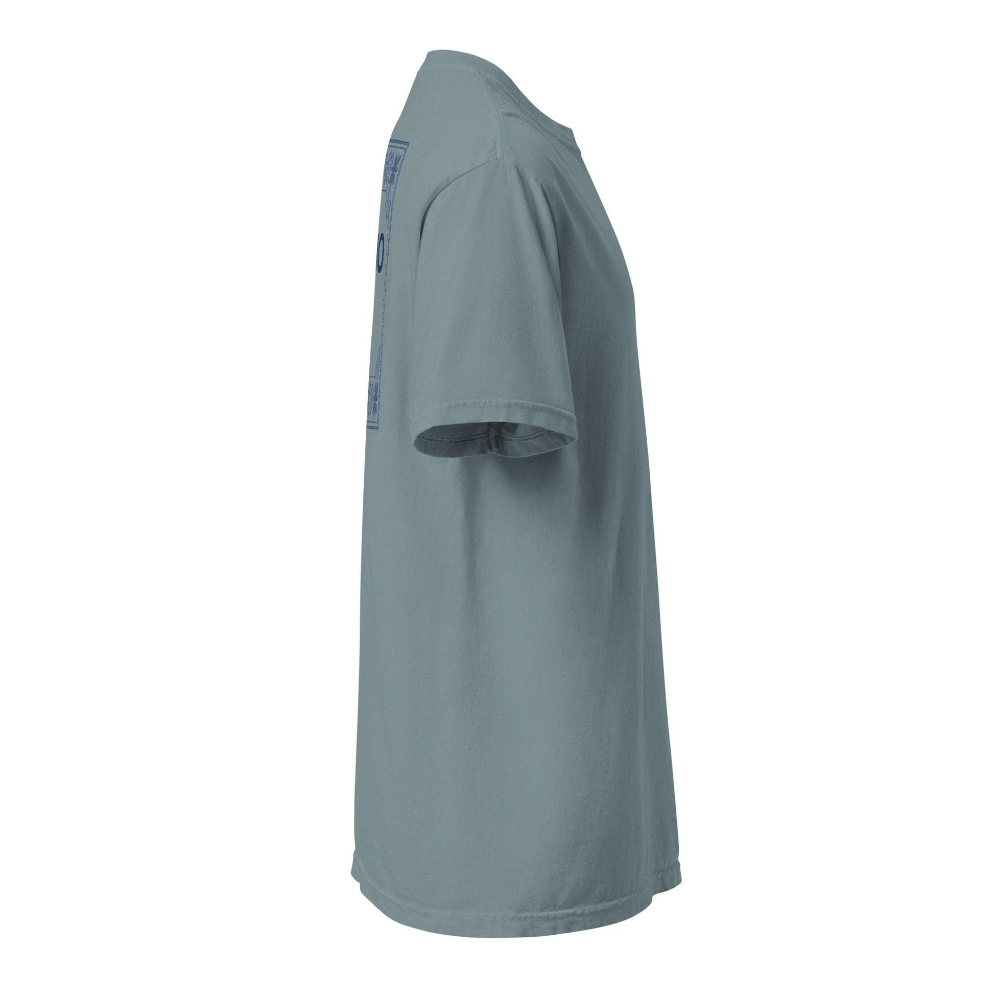 Side view of a blue Fresno x Punjabi Pattern Tee featuring modern English and Punjabi script with a traditional Punjabi-inspired geometric and floral border design