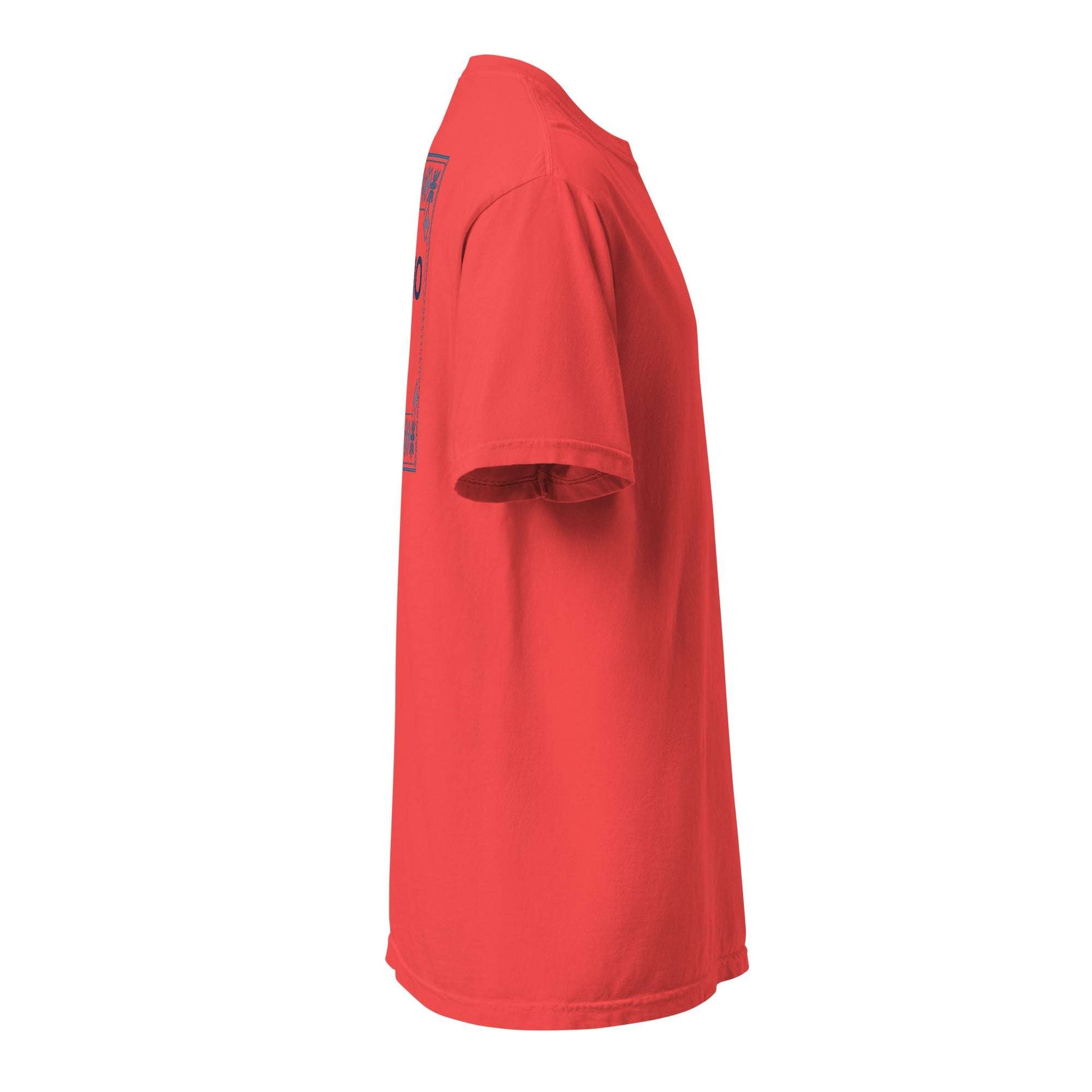 Side view of red Fresno x Punjabi Pattern Tee with traditional Punjabi-inspired border and bilingual Fresno wordmark design